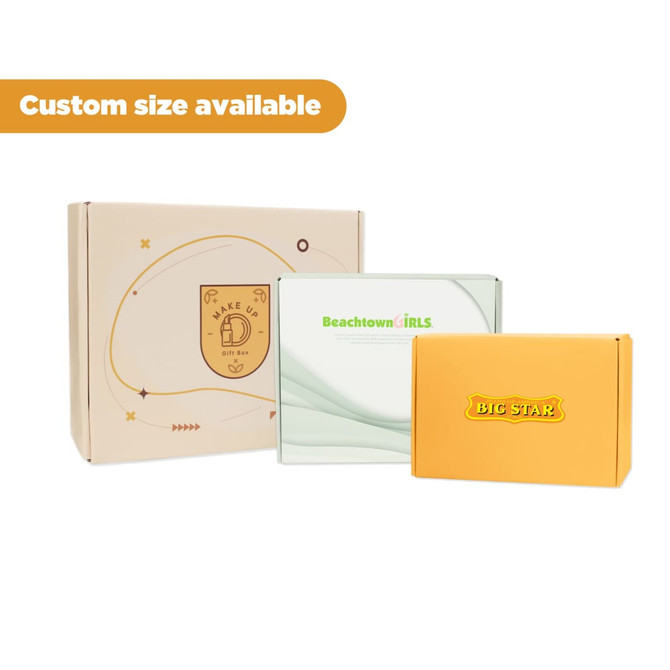Three product boxes in various colours: a brown box with a logo, a clear box, and an orange box with branding.