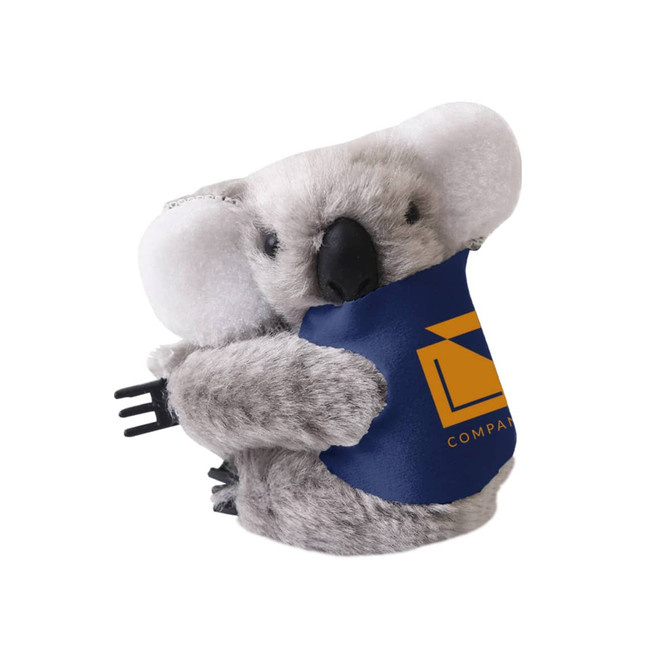 A grey koala plush toy with large ears, featuring a blue and yellow logo on its belly.