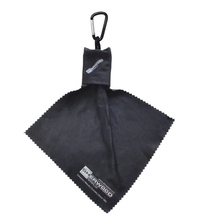 A black microfibre lens cloth with a carabiner attachment, featuring a logo and a textured edge.