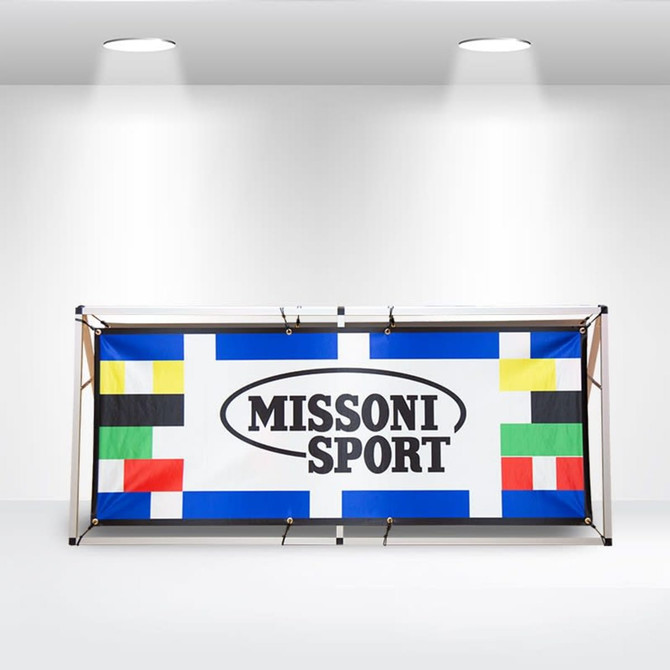A-frame banner stand featuring a colourful design with geometric shapes and a central logo.