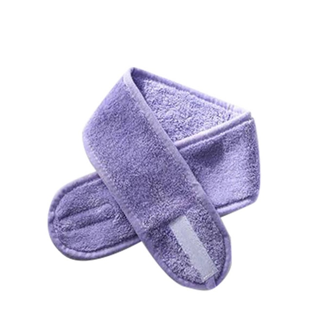 A purple promotional headband made of soft material, featuring a logo and designed for headwear.