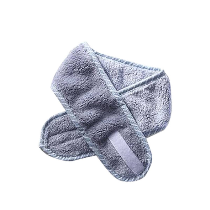A grey promotional headband made of soft material, featuring a logo and a comfortable design.