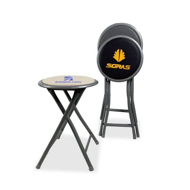 A black folding stool with a logo, alongside a stack of similar stools, featuring a grey frame and seat.