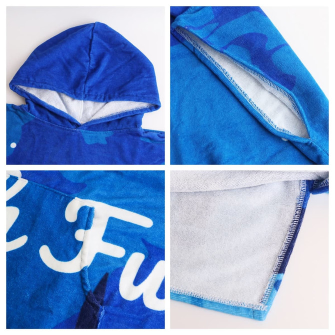A blue cotton surf poncho featuring a hood and soft inner lining, with a logo and decorative patterns.