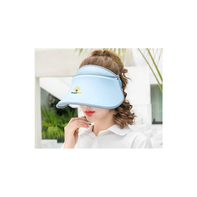 A light blue 360° swivel sun visor hat worn by a woman, featuring a logo on the front.