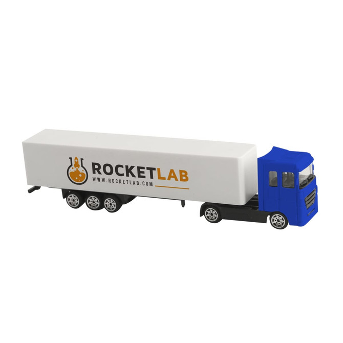 A blue truck toy with a white trailer featuring a branding logo. The truck is designed as a novelty item.