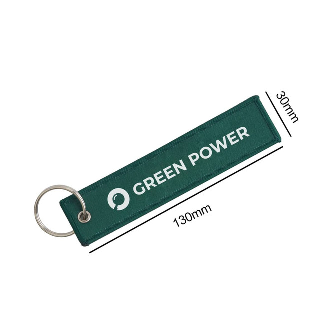 A green woven key tag featuring a ring for attachment and a logo, measuring 130mm by 30mm.