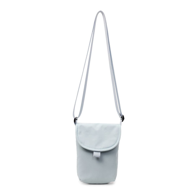 A light blue canvas shoulder bag with a flap and an adjustable strap. It features a logo on the front.