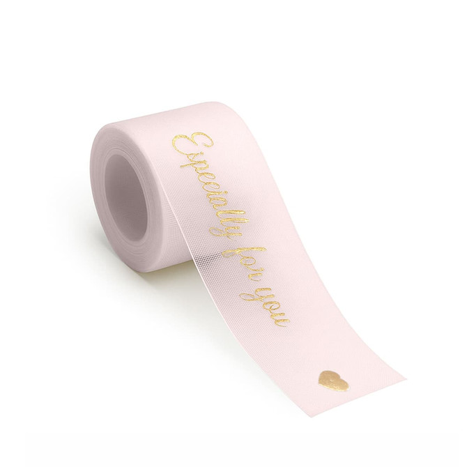 A roll of pink organza ribbon with gold text reading "Especially for you" and a small heart symbol.