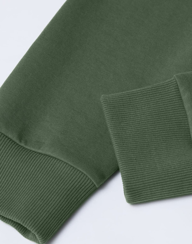 A green unisex crew neck sweater with ribbed cuffs and a smooth finish, featuring a logo on the fabric.