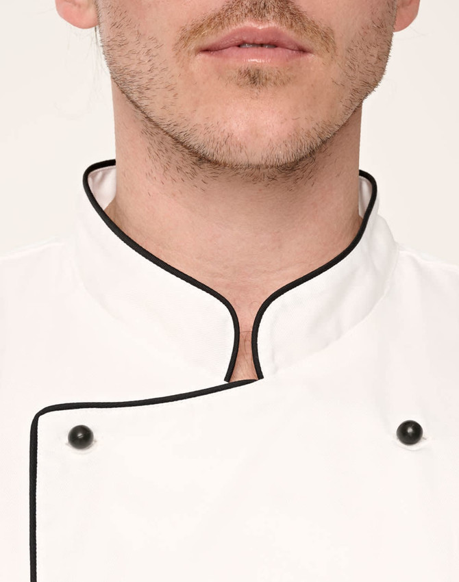 A unisex executive chef jacket in white with black piping and buttons, featuring a classic collar design.