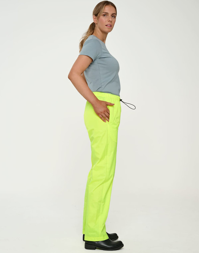 Lightweight nylon waterproof rain pants in bright yellow, featuring a drawstring waist and side pockets.