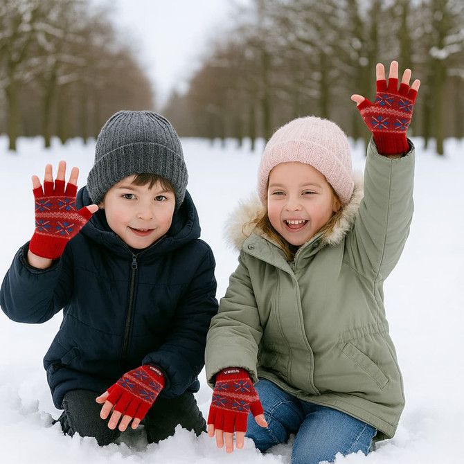 Fingerless gloves in red with patterned designs, worn by two children in winter attire, playing in the snow.