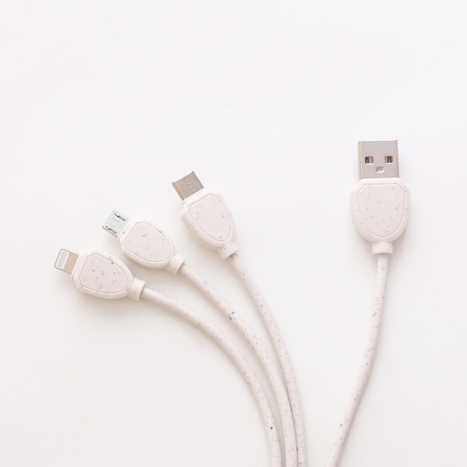 A square-shaped charging cable in white, featuring multiple connectors at one end and a logo on the connectors. A square-shaped charging cable in white, featuring multiple connectors at one end and a logo on the connectors.