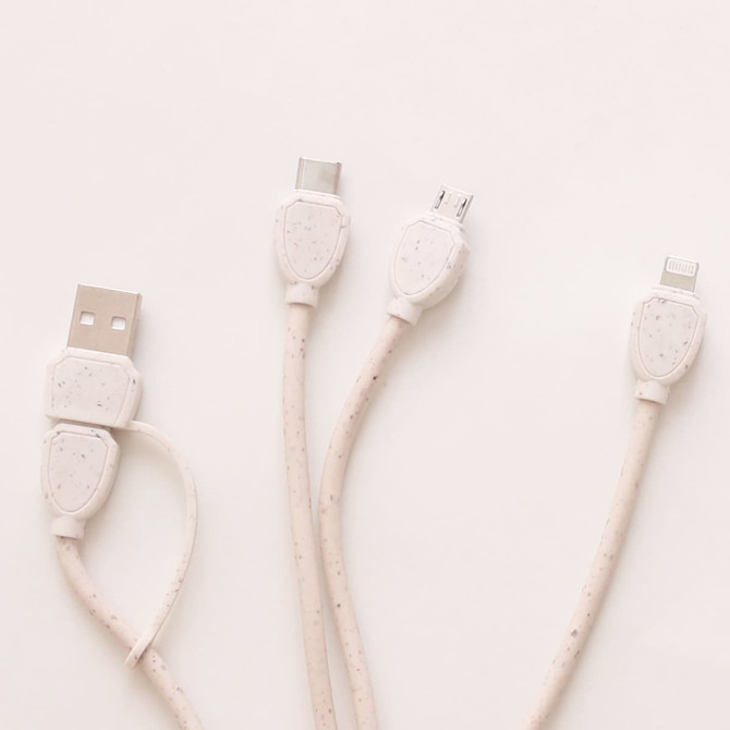 A wheat straw charging cable in a man shape, featuring white and beige tones and multiple connector types. A wheat straw charging cable in a man shape, featuring white and beige tones and multiple connector types.