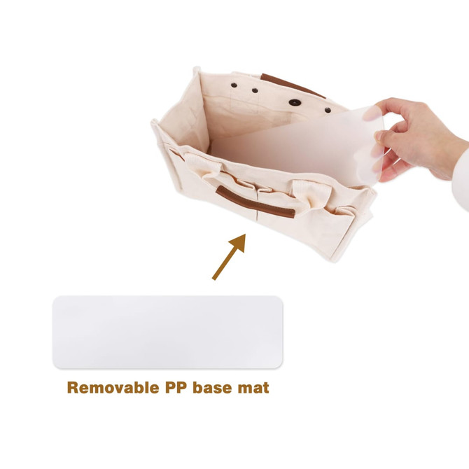 A canvas tote bag in beige with straps, featuring a removable clear PP base mat inside. A canvas tote bag in beige with straps, featuring a removable clear PP base mat inside.