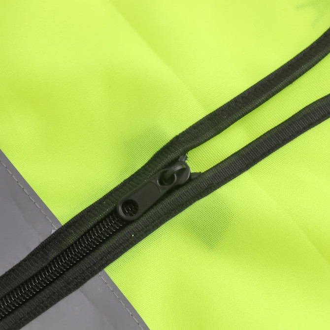 A close-up of a bright yellow hi-vis vest featuring a zipper, with a grey trim and reflective tape accents.