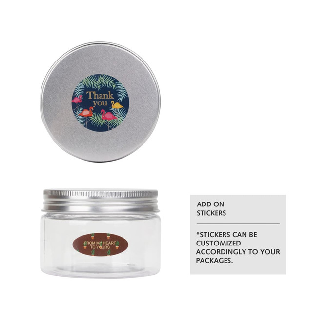 A 120ml round clear container with a silver aluminium lid and decorative sticker on top.