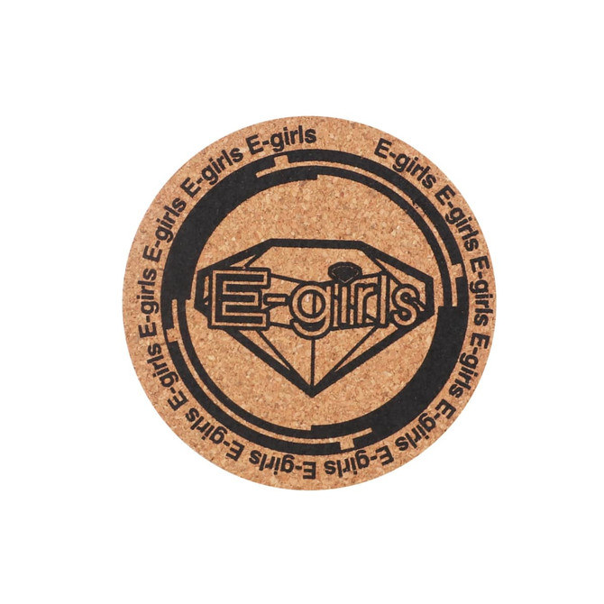 A circular cork coaster with a black logo and design featuring the text "E-girls". The coaster is a natural cork colour.