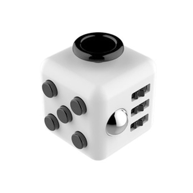 A white fidget cube with black buttons and a shiny steel ball, featuring various tactile surfaces and a logo.