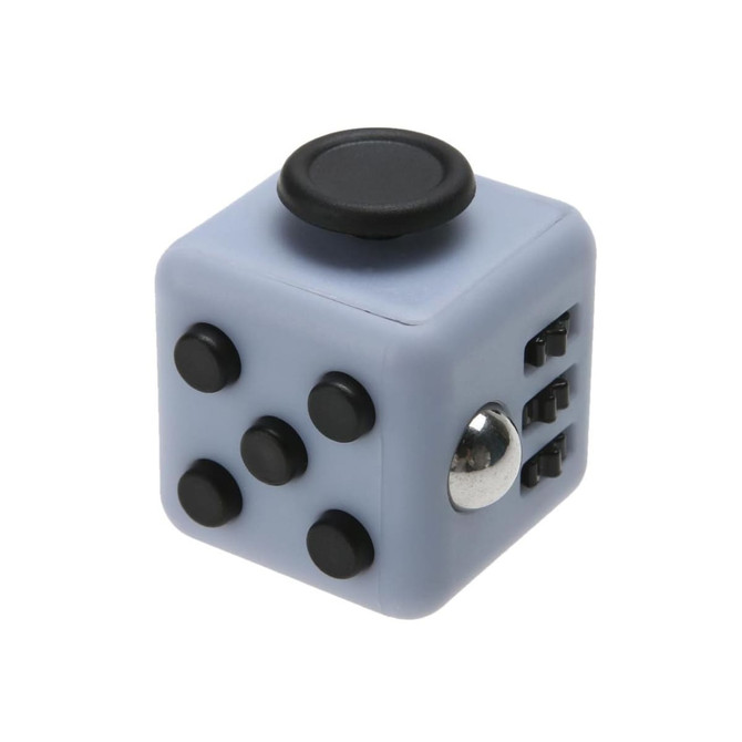 A fidget cube in light blue and black, featuring various tactile buttons and a shiny metal ball.