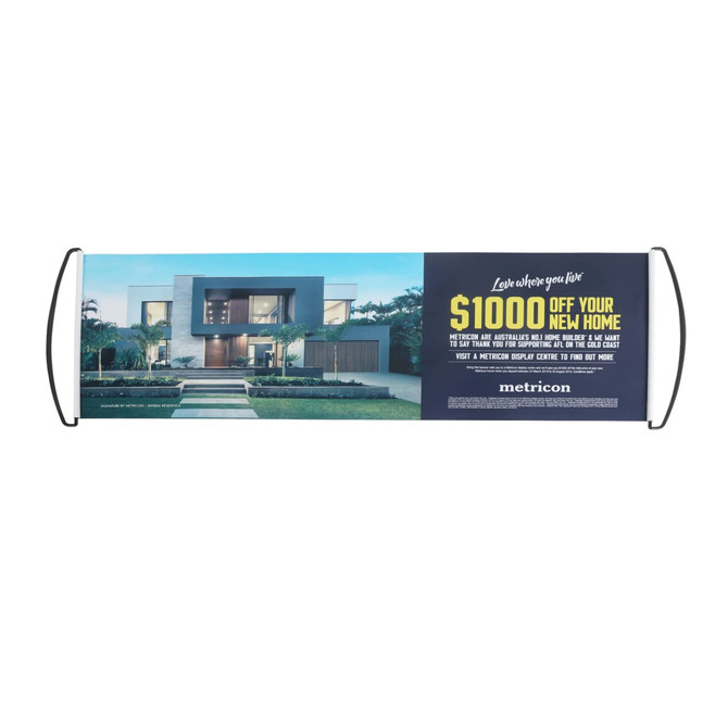A promotional banner featuring a modern home design with a large text display. The banner has handles for easy display.