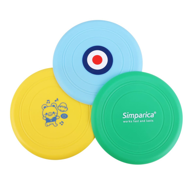 Three silicone frisbees in blue, yellow, and green, featuring various designs and a logo on one.