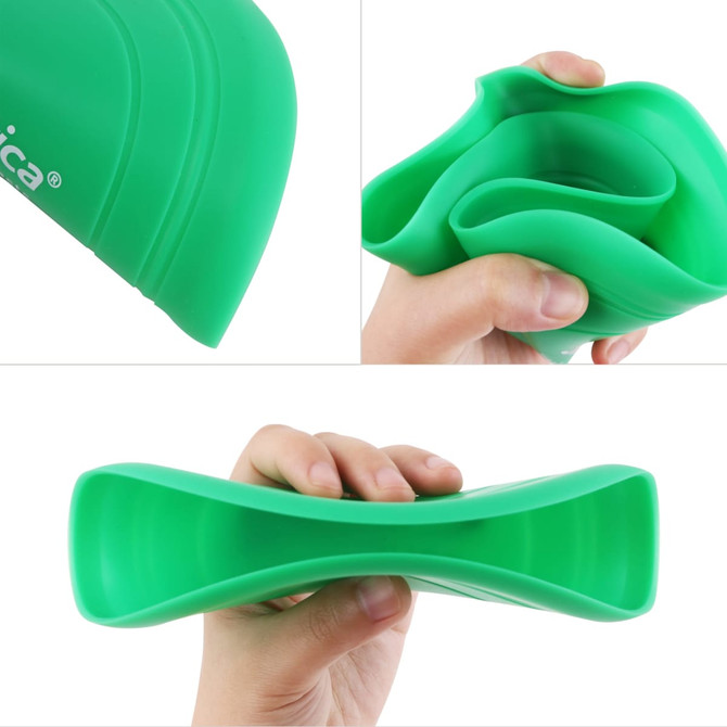 A green silicone frisbee is shown, held in a hand, demonstrating its flexible and collapsible design.