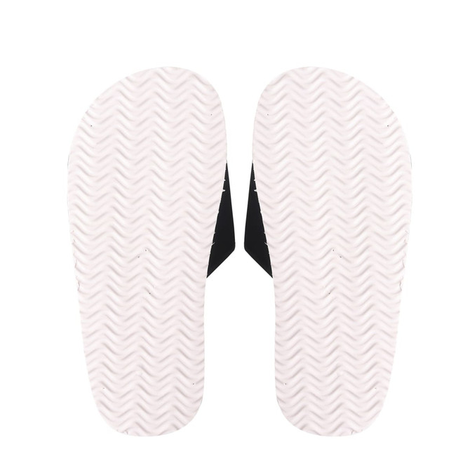 Black EVA slides with a textured white sole, featuring a simple design and no visible branding. Black EVA slides with a textured white sole, featuring a simple design and no visible branding.