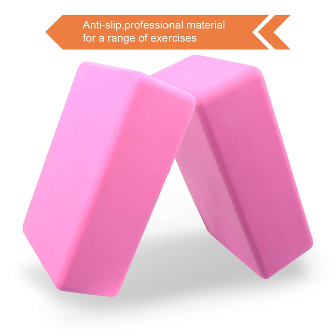 Two pink EVA yoga blocks with a smooth surface and angled edges, featuring a branding logo.