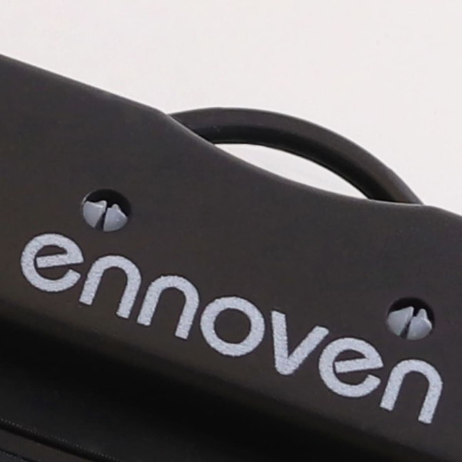 A black waterproof mobile pouch featuring a logo, designed for protecting smartphones and small devices.