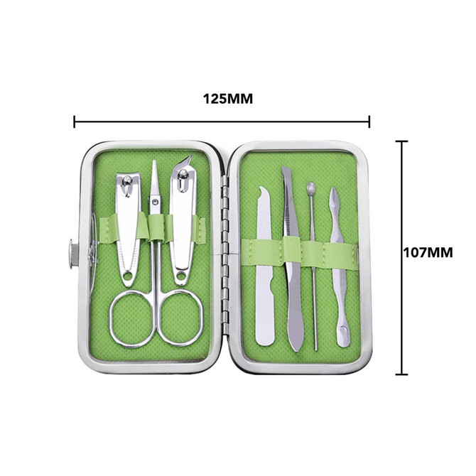A stylish manicure set in a silver case featuring green interior, including scissors, nail clippers, and various tools. A stylish manicure set in a silver case featuring green interior, including scissors, nail clippers, and various tools.