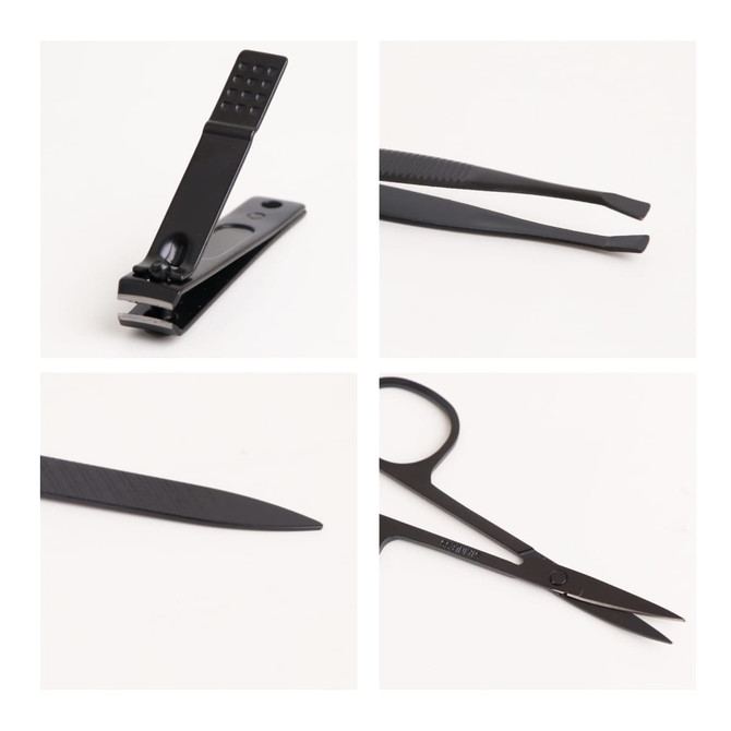 A portable manicure set featuring black nail clippers, tweezers, a nail file, and scissors, all compactly arranged.