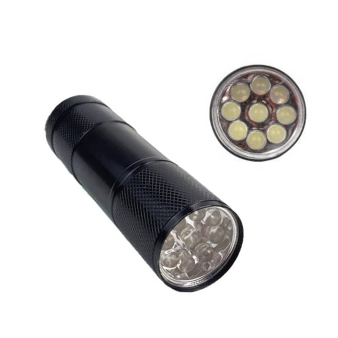 A black portable LED torch with multiple light bulbs on the front, featuring a textured grip and circular end.