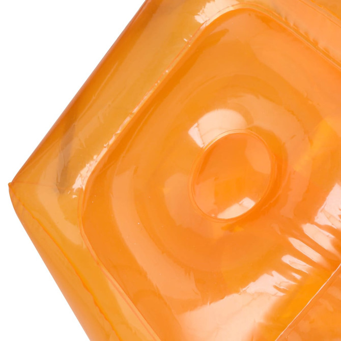 An orange inflatable chair with a smooth, glossy surface and a circular indentation in the centre.