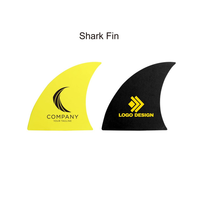 Two surfboard fins, one in bright yellow with a logo and text, and another in black with a different logo.