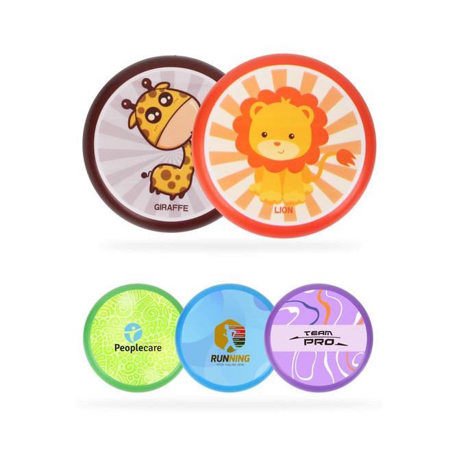 Two soft frisbees featuring a giraffe and a lion design, alongside three flat circular discs in various colours.