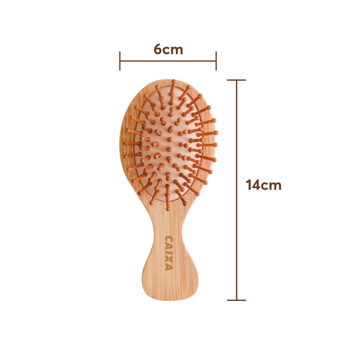 A small bamboo hairbrush featuring a wooden body and orange bristles, measuring 6cm by 14cm.