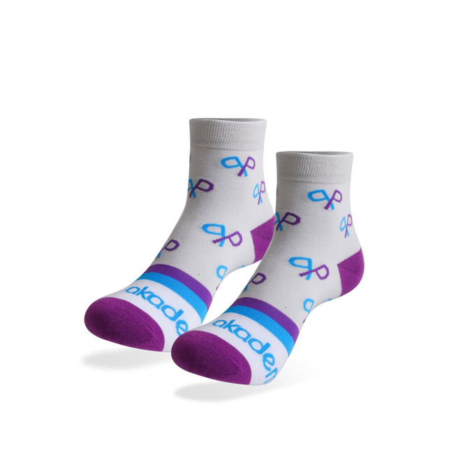 Ankle socks in grey with purple and blue patterns, featuring a towel bottom and a logo on the band.