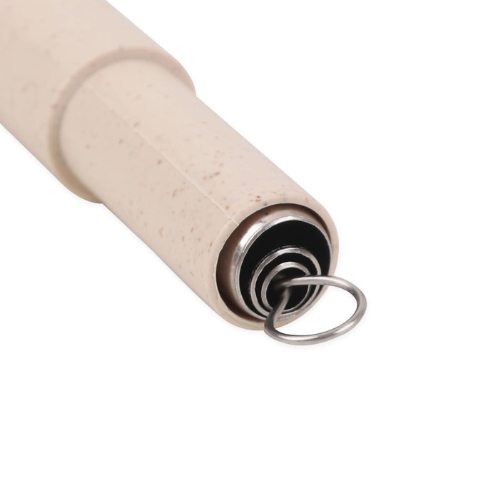 A cream-coloured eco-friendly straw with a metal attachment. It has a textured finish.