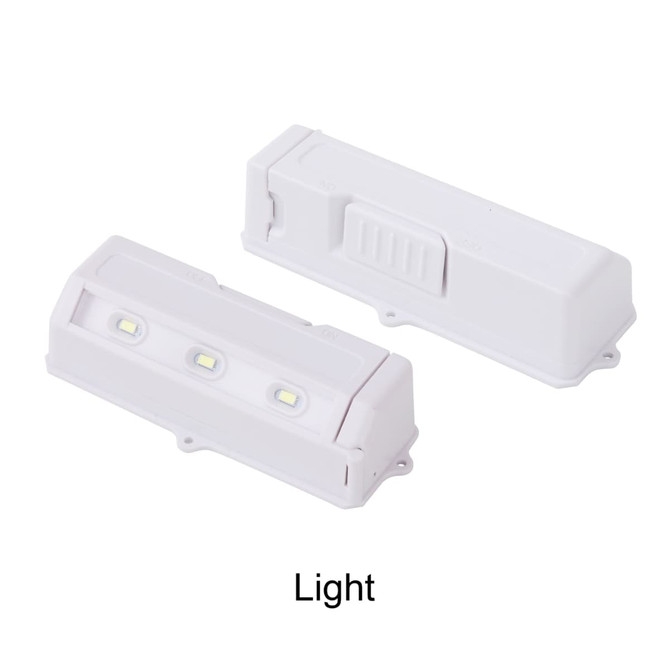 A light fixture in white, featuring three LED bulbs and a compact design, with a logo on the surface. A light fixture in white, featuring three LED bulbs and a compact design, with a logo on the surface.