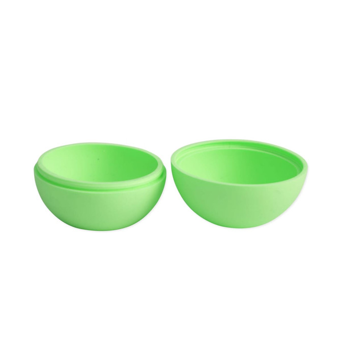 A pair of bright green silicone moulds for creating whisky ice balls, featuring a smooth finish and rounded shape.