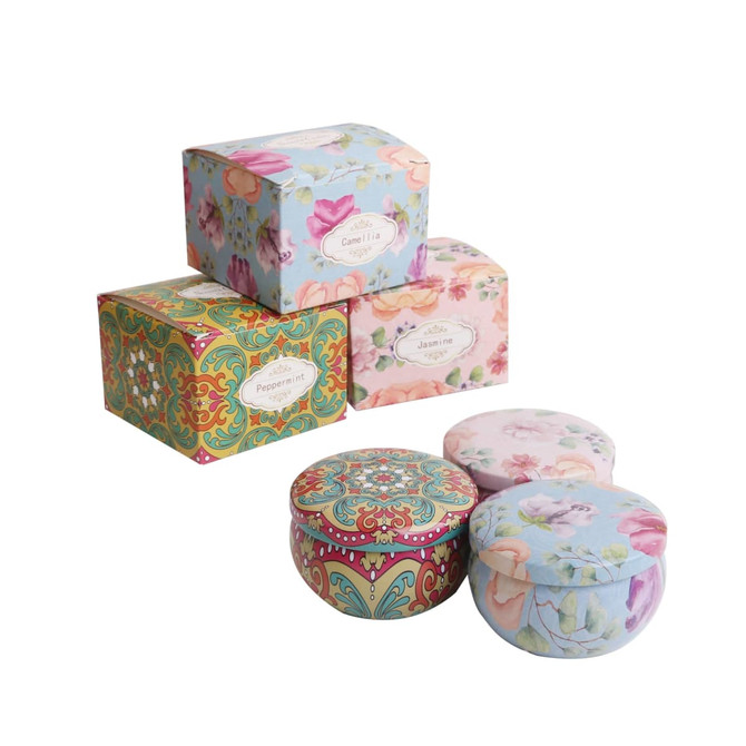 A collection of decorative tin candle boxes featuring floral patterns in various colours and designs. A collection of decorative tin candle boxes featuring floral patterns in various colours and designs.
