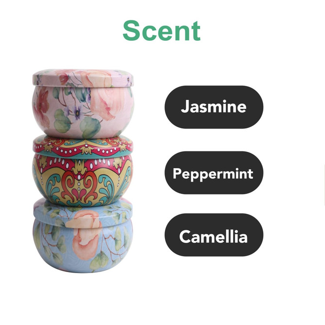 Three decorative tin candles in pastel colours, featuring floral designs, stacked with scents: Jasmine, Peppermint, Camellia. Three decorative tin candles in pastel colours, featuring floral designs, stacked with scents: Jasmine, Peppermint, Camellia.