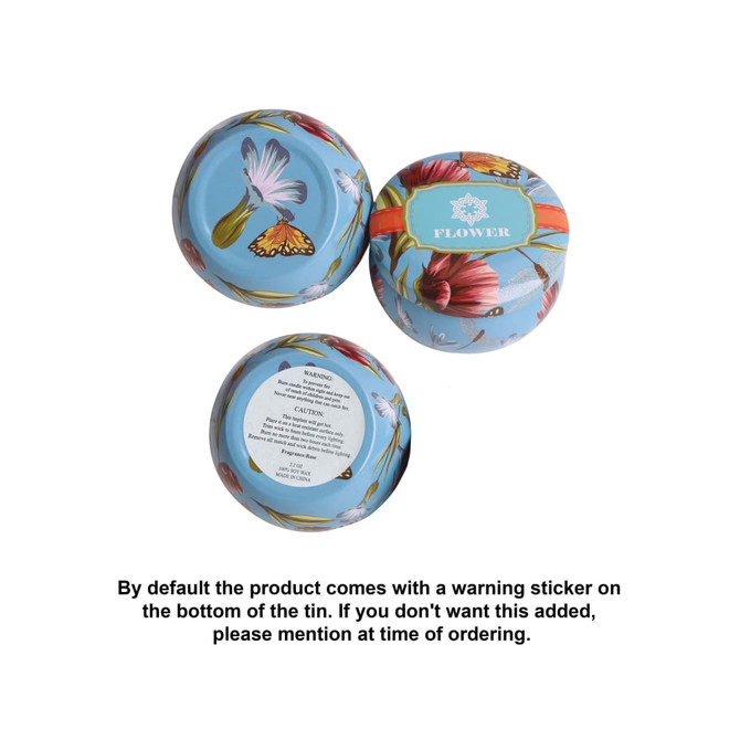A tin candle set featuring floral designs in pastel colours, including three round tins and one larger tin.