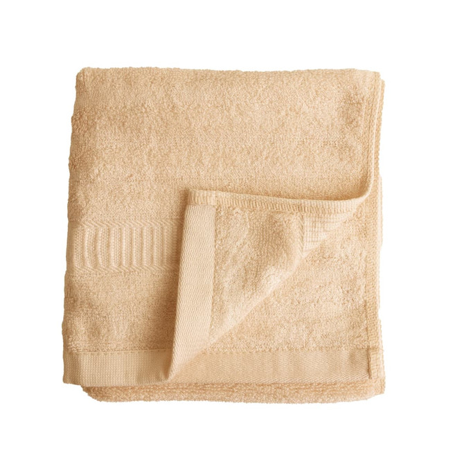 A folded bamboo fibre towel in a light beige colour, featuring a textured surface and a woven band detail. A folded bamboo fibre towel in a light beige colour, featuring a textured surface and a woven band detail.
