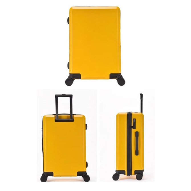 A yellow wheeled suitcase with a retractable handle and smooth wheels, featuring a sleek design and a logo. A yellow wheeled suitcase with a retractable handle and smooth wheels, featuring a sleek design and a logo.