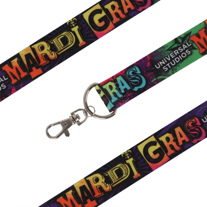 A colourful sublimation lanyard featuring a logo, predominantly in black with vibrant Mardi Gras designs.