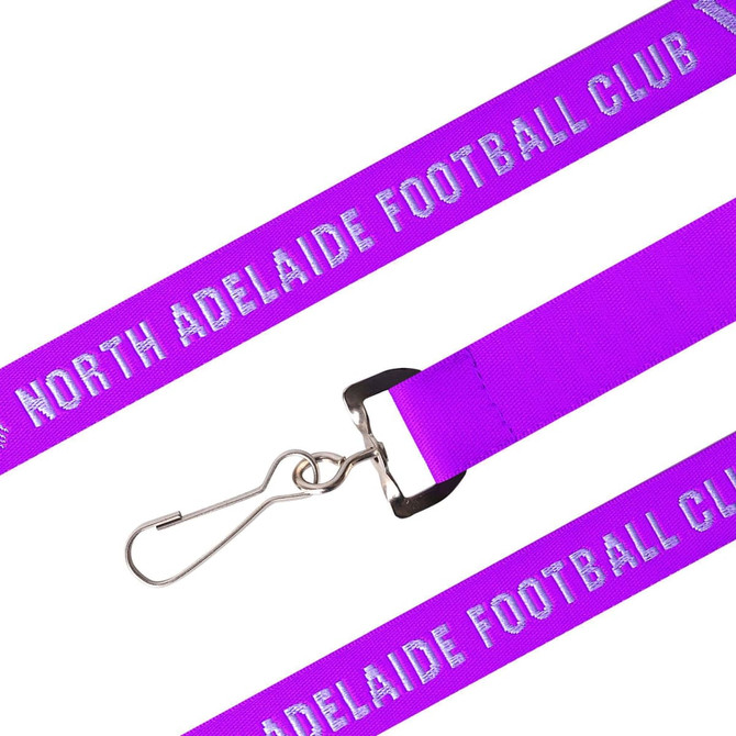 A purple woven lanyard featuring a metal attachment and branding elements.