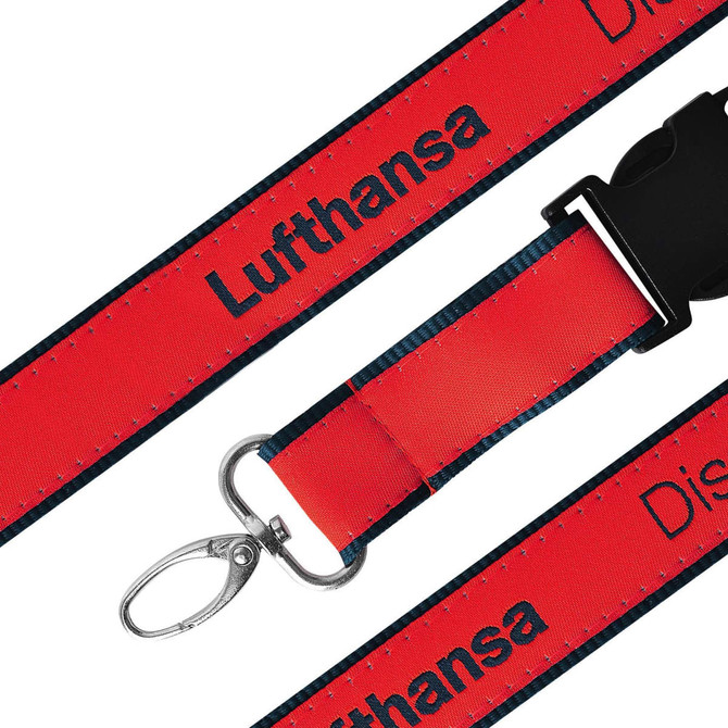 A red woven lanyard featuring black accents and a metal attachment clip. It has branding elements.